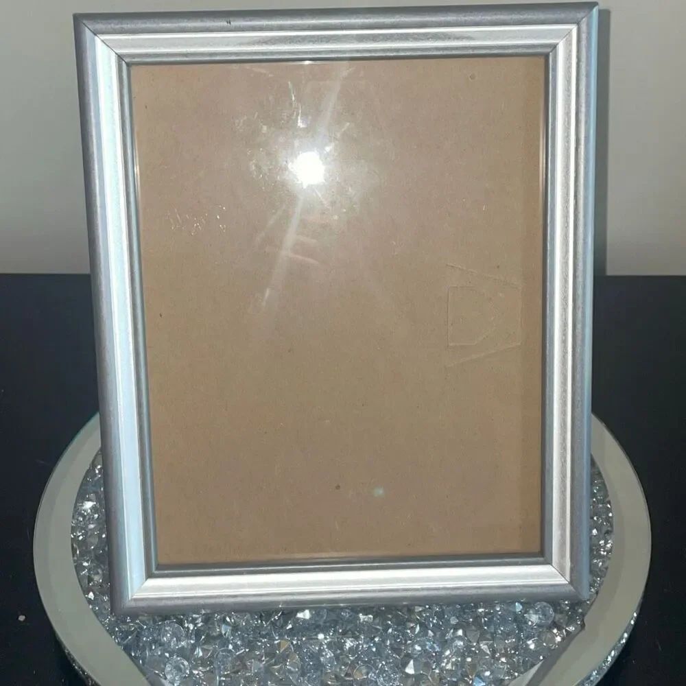 Simple silver metal picture frame standing and wall mountable 8x10 inches
